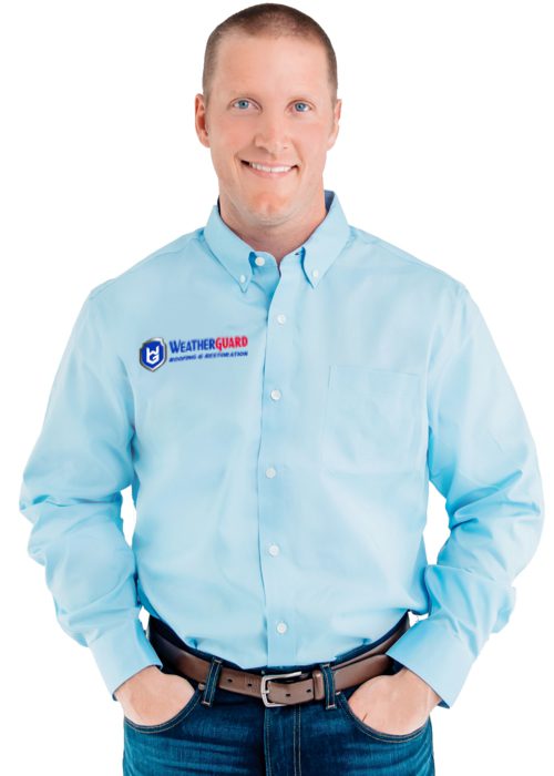 Weatherguard Roofing & Restoration | A Weatherguard Roofing and Restoration team member wearing a blue company shirt with an embroidered company logo