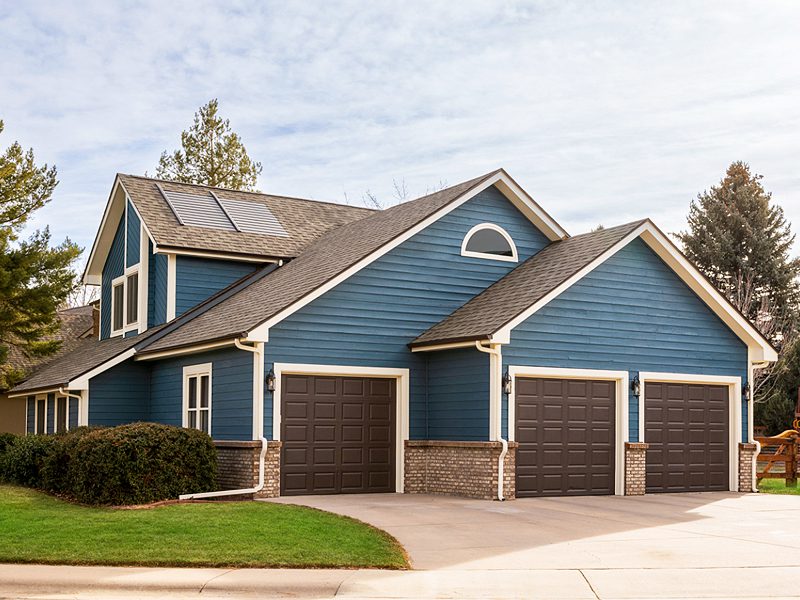 weatherguard-blue-home-with-timberline-solar-roofing