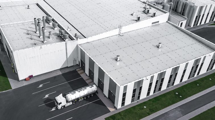 Weatherguard Roofing & Restoration | new metal roof on a large commercial building