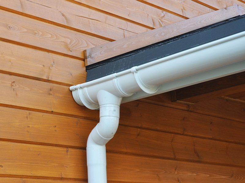 Weatherguard Roofing & Restoration | Close up view of gutters installed on a home after storm damage